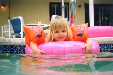 Lizzie floating in the pool