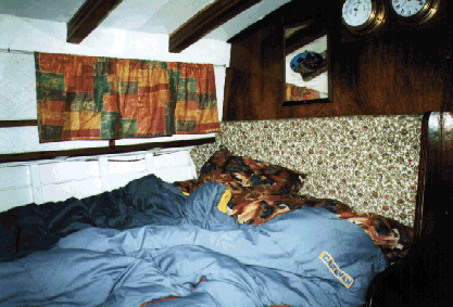 Cabin with table converted to double berth